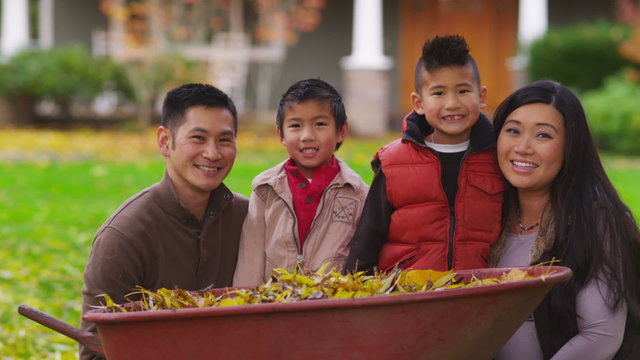 Portrait of Asian family in fall