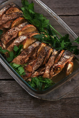 Salmon baked in the oven with lemon and fresh herbs