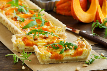 Pumpkin tart with cheese and nuts.