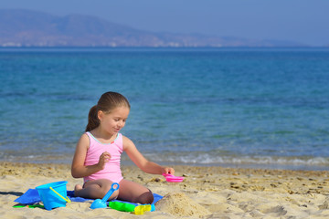 Real toddler girl enjoying her summer vacation