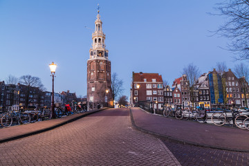 Obraz premium Oudeschans Canal and Montelbaanstoren Tower in Amsterdam