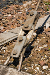 Turnbuckle and Electrical Insulation - Railway / Detail of an turnbuckle and electrical insulation of the Italian railways