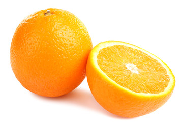 large and delicious sliced oranges laid out on a white isolated background