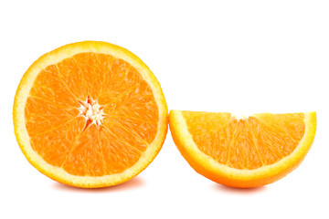 large and delicious sliced oranges laid out on a white isolated background