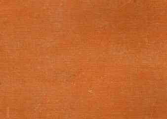 Dirty orange book cover texture.