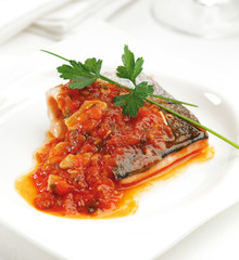 Trout fillet with tomato and mushroom sauce