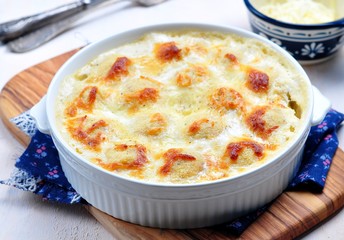fish balls baked in a creamy sauce with mozzarella
