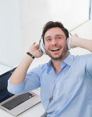 Portrait of handsome man in earphones