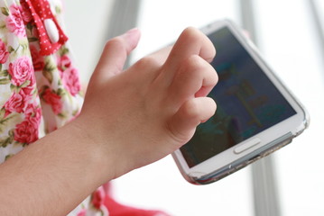 Little girl using mobile