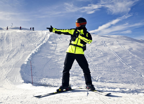 young man enjoying winter skiing