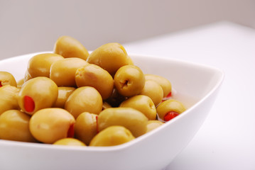 green olives, stuffed with red peppers
