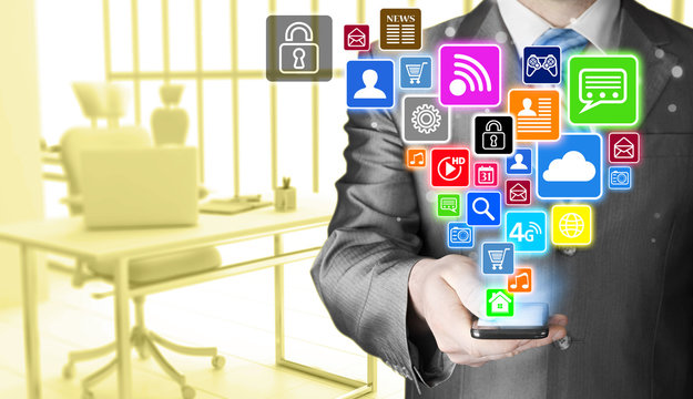 Business man using smart phone with social media icon set