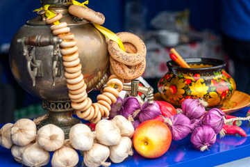 Gold samovar with bagels composition