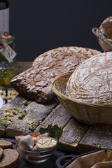Round ( homemade ) bread over rustic background
