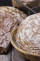 Round ( homemade ) bread over rustic background