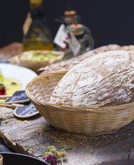 Round ( homemade ) bread over rustic background