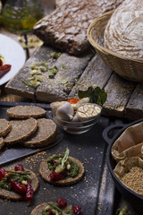 italian canapes set over rustic background