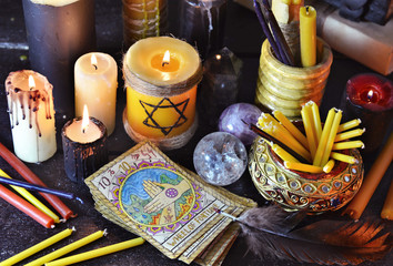 Still life with magic objects, candles and the tarot cards