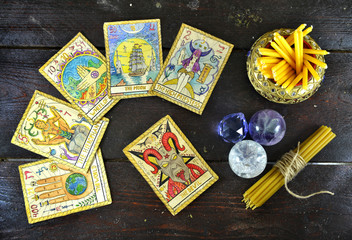 Still life with the tarot cards, magic stones and candles, top view