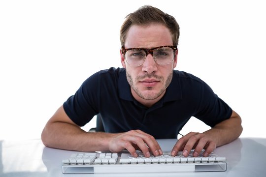 Handsome man using computer on white background