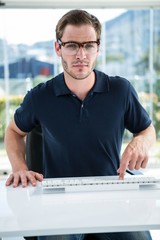Handsome man using computer in the office