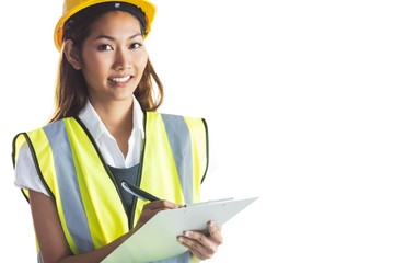 Architect woman with yellow helmet and plans