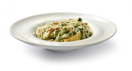 Pasta with spinach and zucchini. Front view.