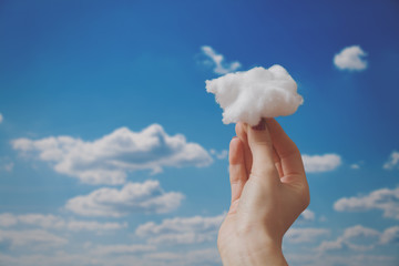 Holding a cloud.