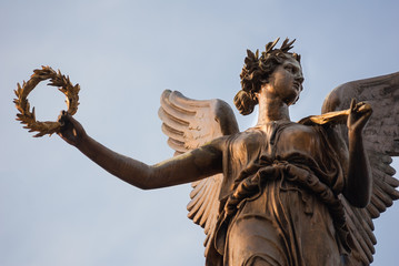 Bronze angel of Victory statue, holding olive branch, Prague © matousekfoto