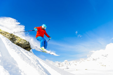 Skiing, Skier, Freeski, Freestyle, Freeride in fresh powder snow