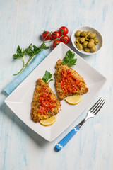 baked fish fillet with tomatoes and olives