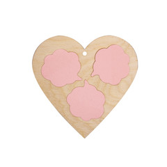 Wooden heart with stickers.