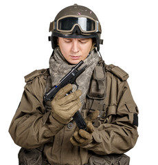 Special forces soldier with rifle isolated on white background