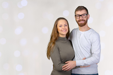 Cheerful young couple standing