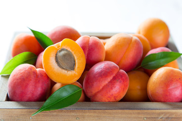 Fototapeta na wymiar Fresh apricots on wooden table
