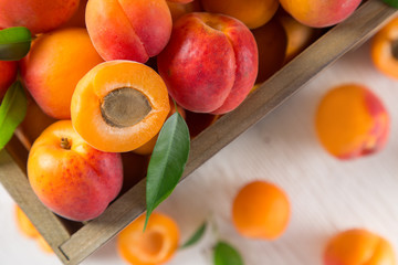 Fresh apricots on wooden table
