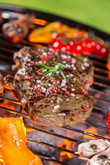 Barbecue grill with various kinds of meat.