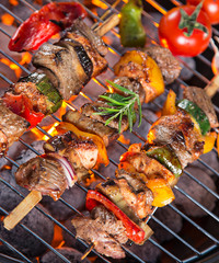 Barbecue grill with tasty skewers. © Lukas Gojda