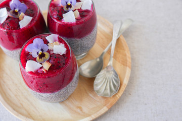 Chia seeds pudding with red dragon fruit and mango