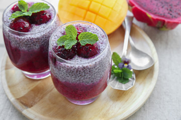 Chia seeds pudding with red dragon fruit and mango