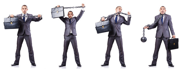 Businessman with shackles on white