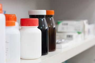 bottles on pharmacy store shelf