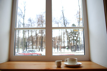Fototapeta na wymiar morning coffee on the window