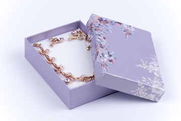 Beautiful necklace with earrings in a purple gift box