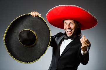 Young mexican man wearing sombrero