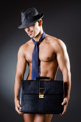 Ripped young man in studio concept