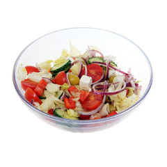 Fresh vegetable salad in transparent ware, isolated on the white