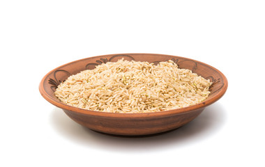 rice in a clay plate isolated
