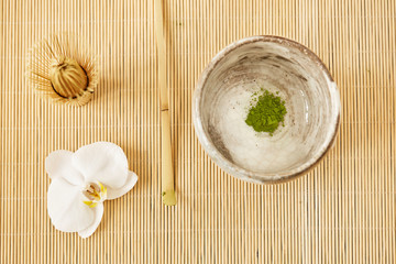 Organic green matcha tea in a bowl