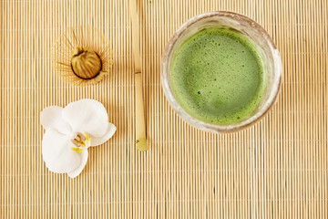 Organic green matcha tea in a bowl